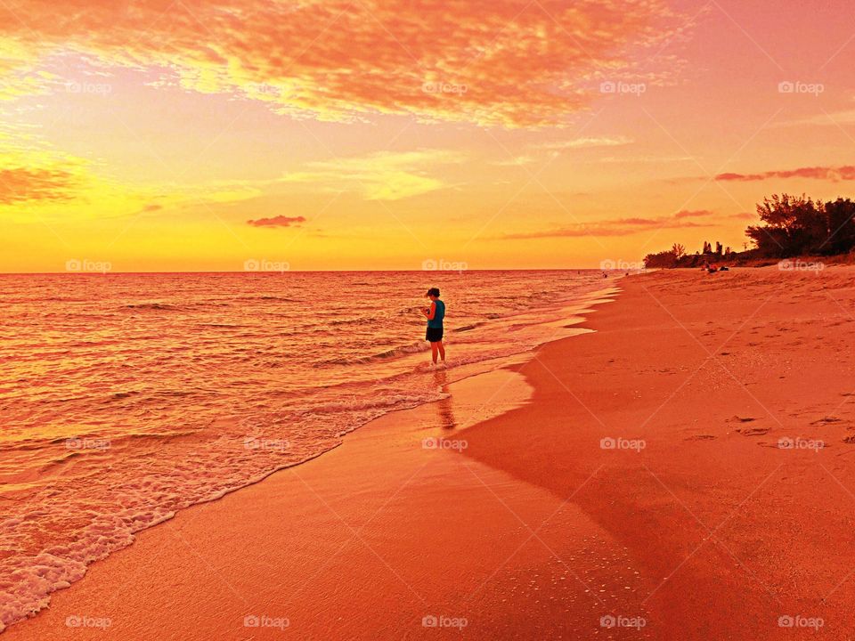 Lady at the beach. Lady at the beach in the golden hour.
