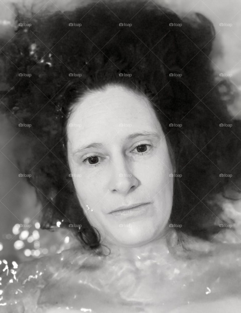 Black & white self portrait in water