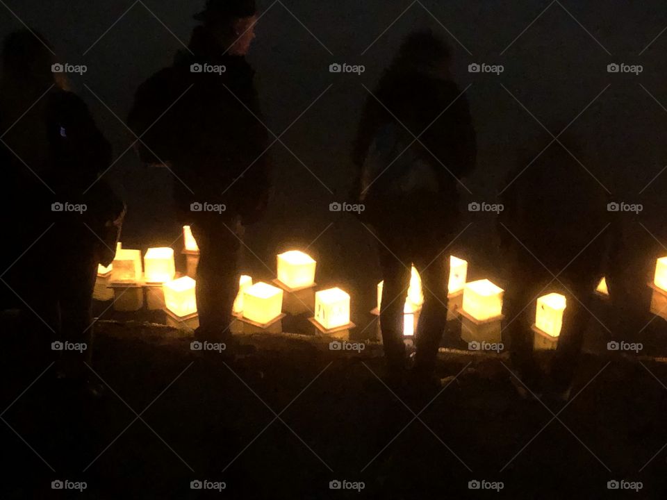 Water Lantern Festival : people gathered in a park to make lanterns, write messages to their loved ones, lost ones, veterans, far away families, and let the lit lanterns into the lake at sundown. Creates a magical experience