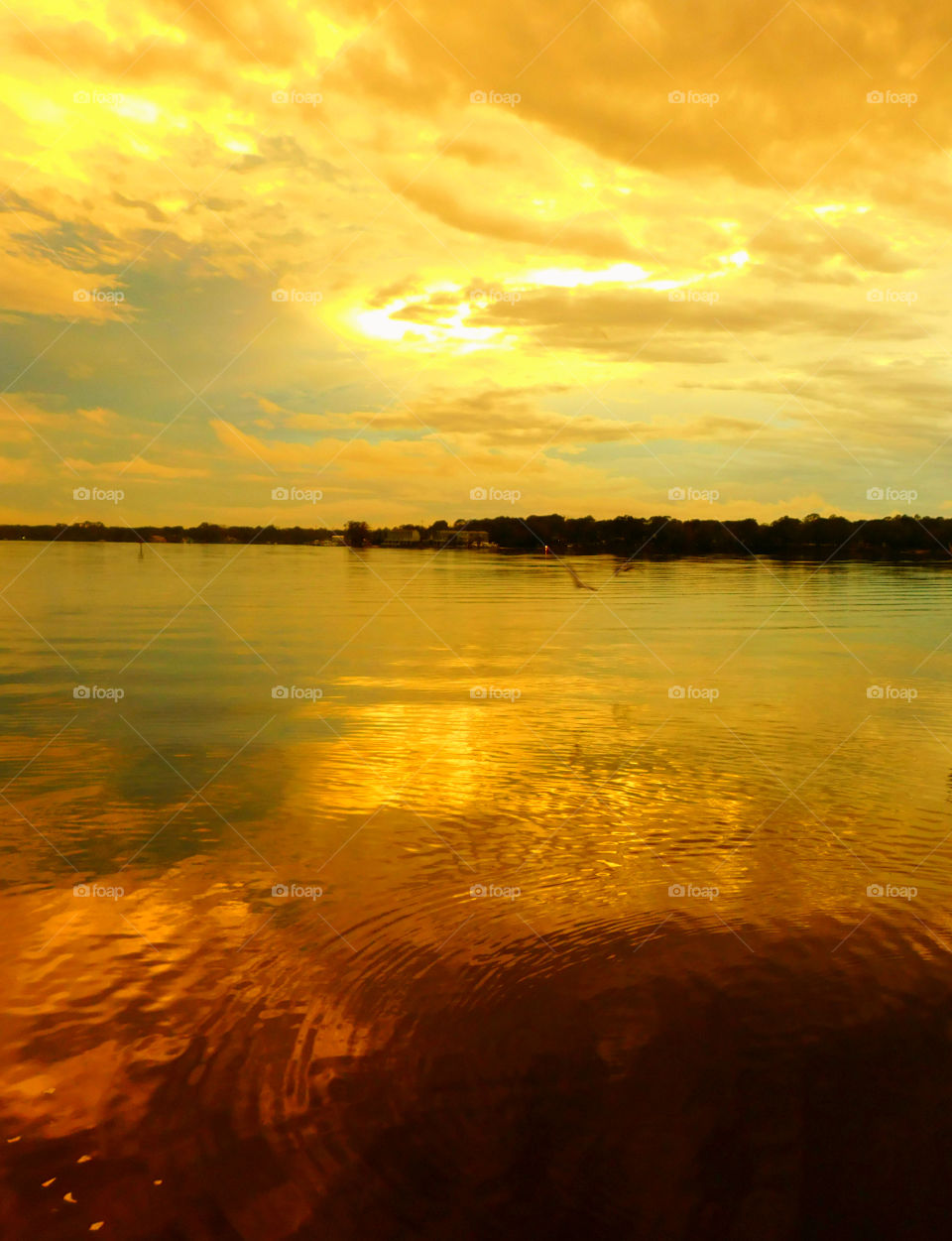 Dramatic clouds reflecting on the lake