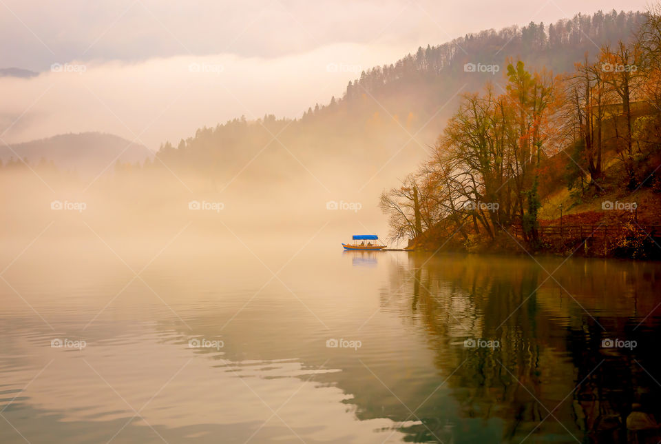 View of a lake in foggy weather