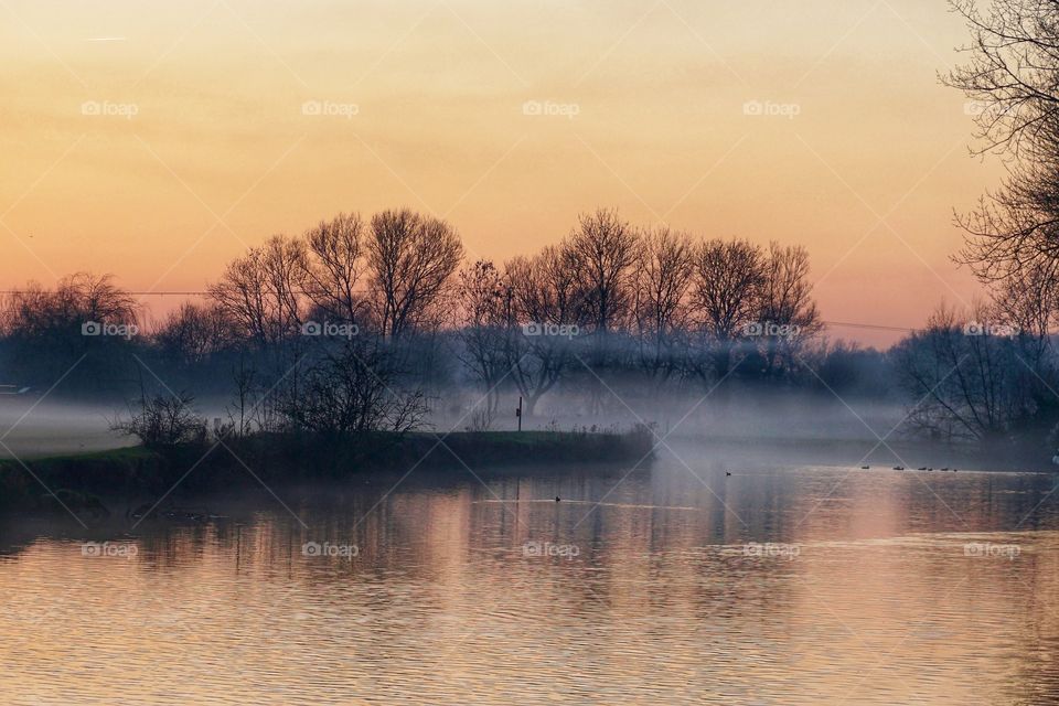 River Mist on a cold Winters day just as the sun was setting .. beautiful peachy glow ...