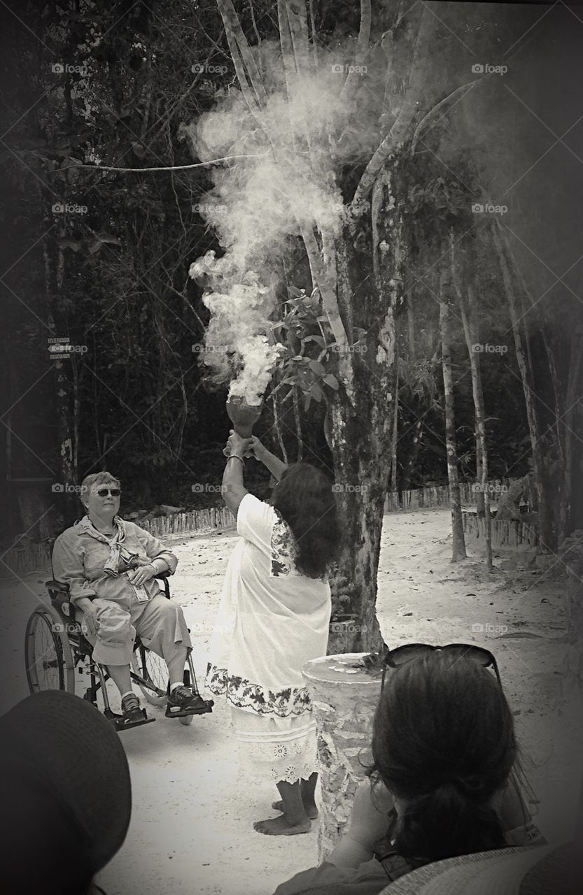 Giving thanks to the Gods and asking for passage into the jungle. This woman is a Mayan descendent and is a medicine woman. It was fascinating...