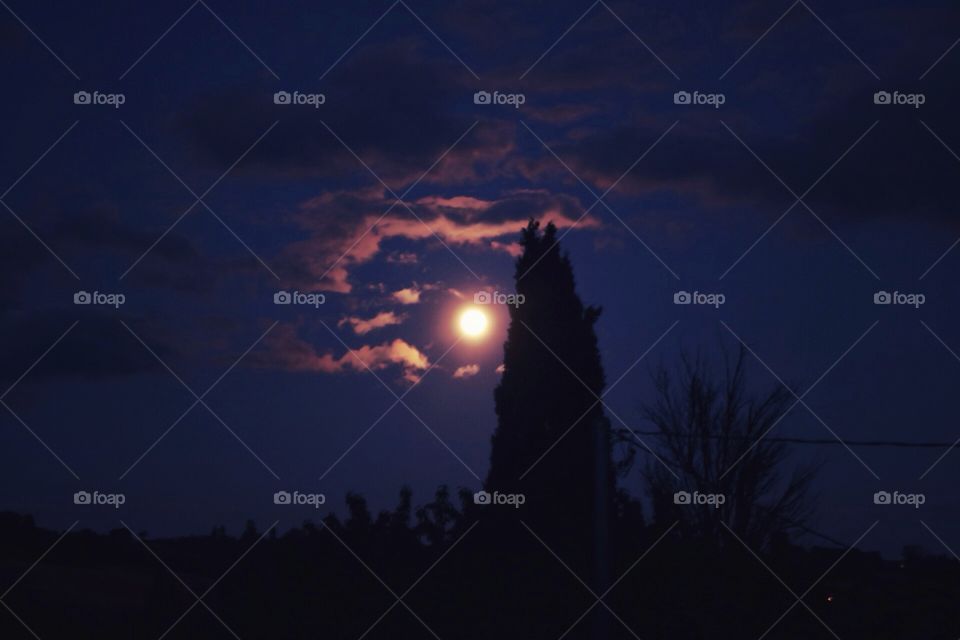 Pink moon above Montone 