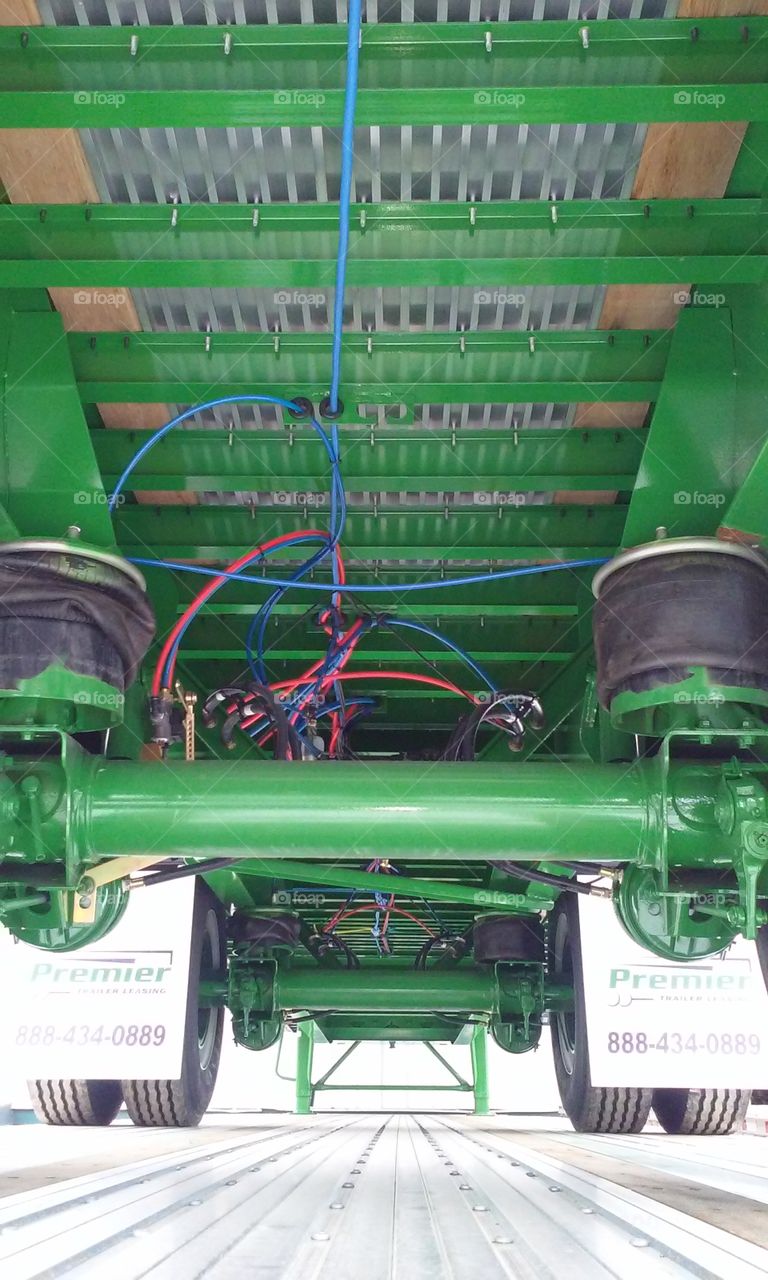 underneath a flatbed trailer