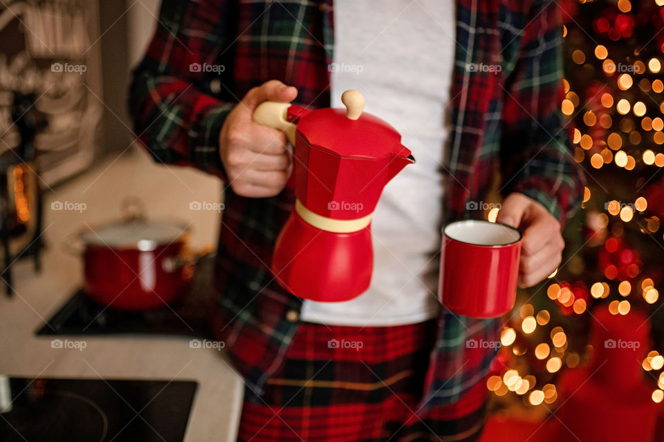 cup of coffee in a cozy festive Christmas atmosphere