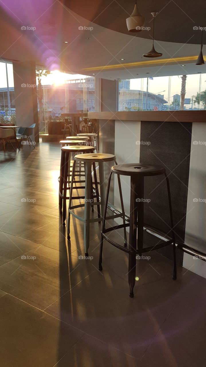 stools at an empty bar