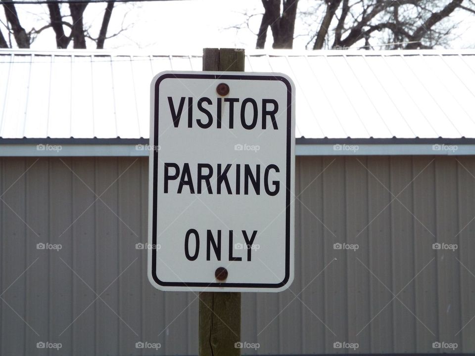 Visitor parking sign