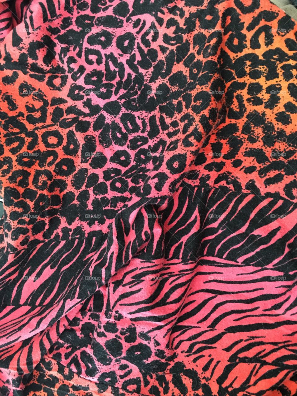 bold and bright ombre orange and pink animal print cotton fabric