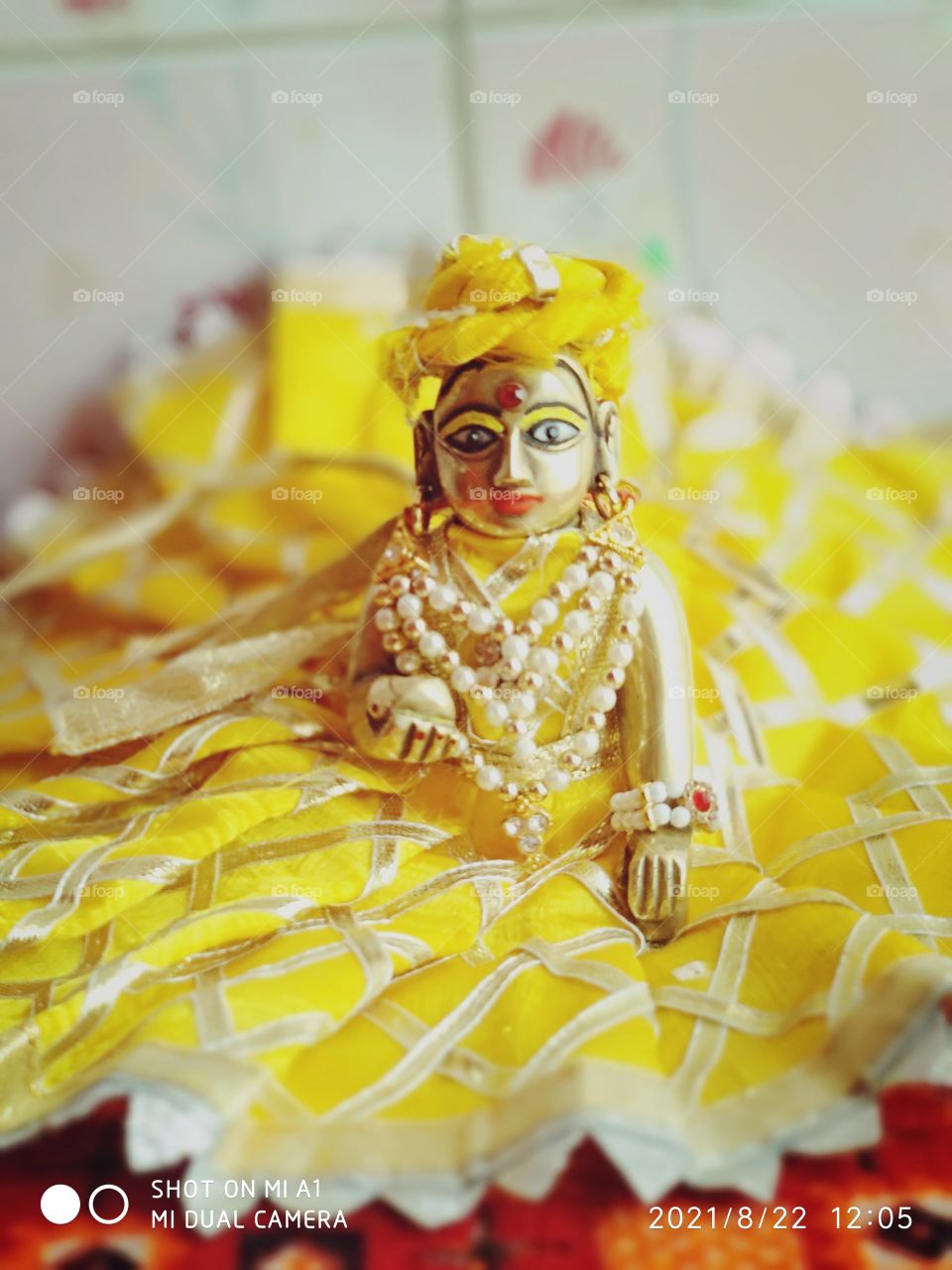 laddu gopal in yellow dress ... beautiful..