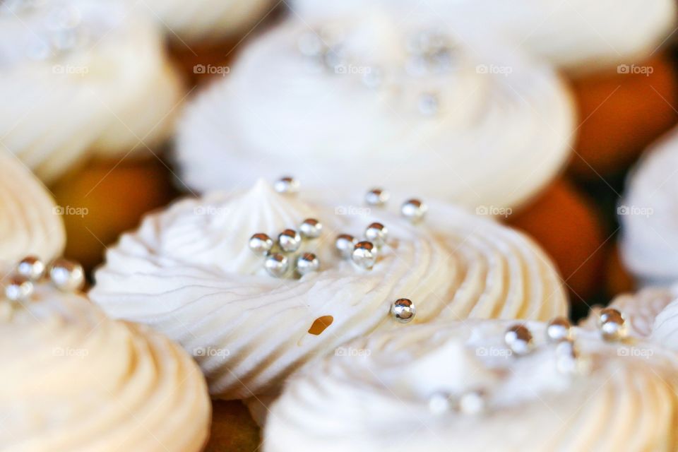 White frosted cupcakes