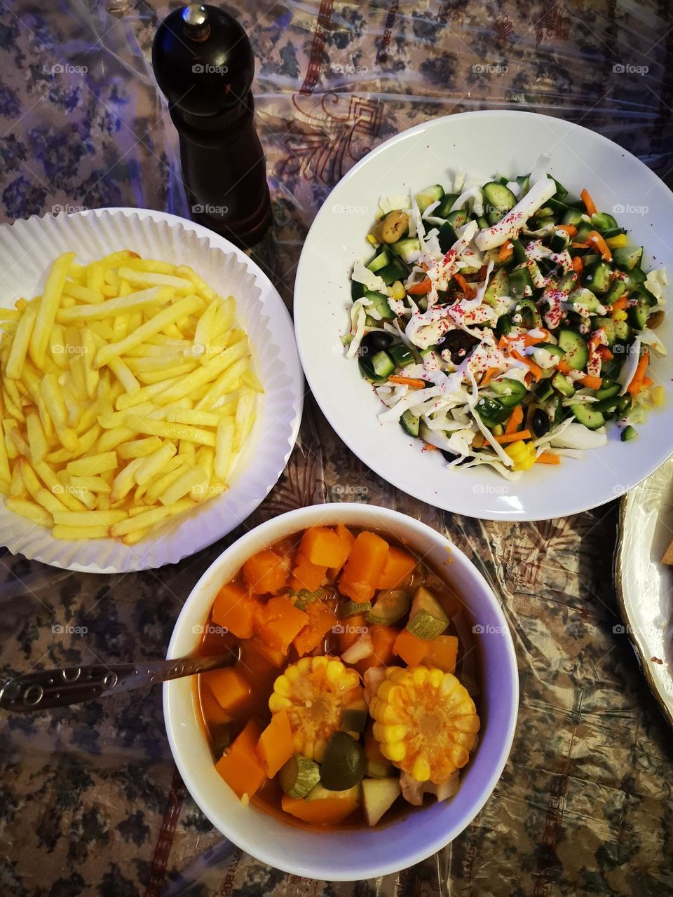 Lunch with vegetable stock in sauce with wheat chips stuffing with meat and cheese