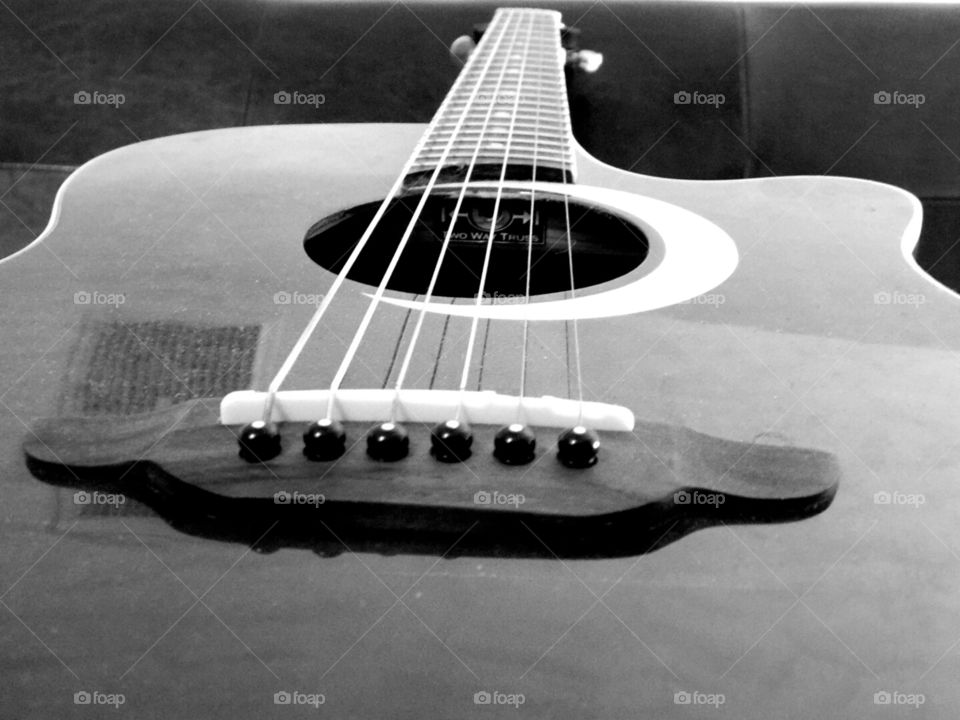 stringed guitar black n white