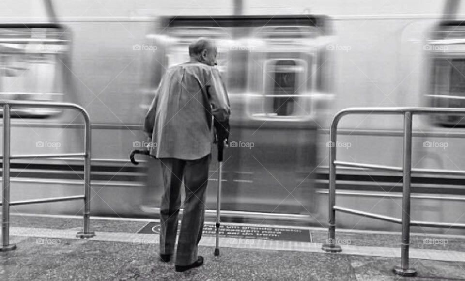 Old man in the subway 