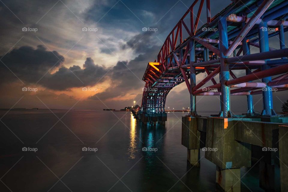 Wonderful Sunset near the iron & steel bridge at Tidung Island.