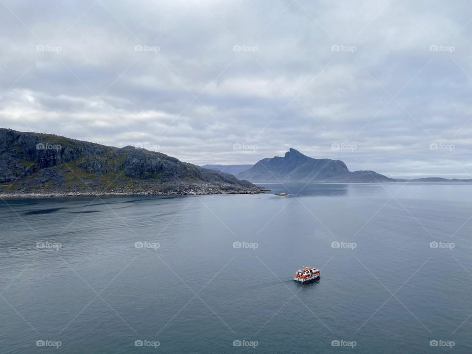 A tender boat in a fjord in Greenland 