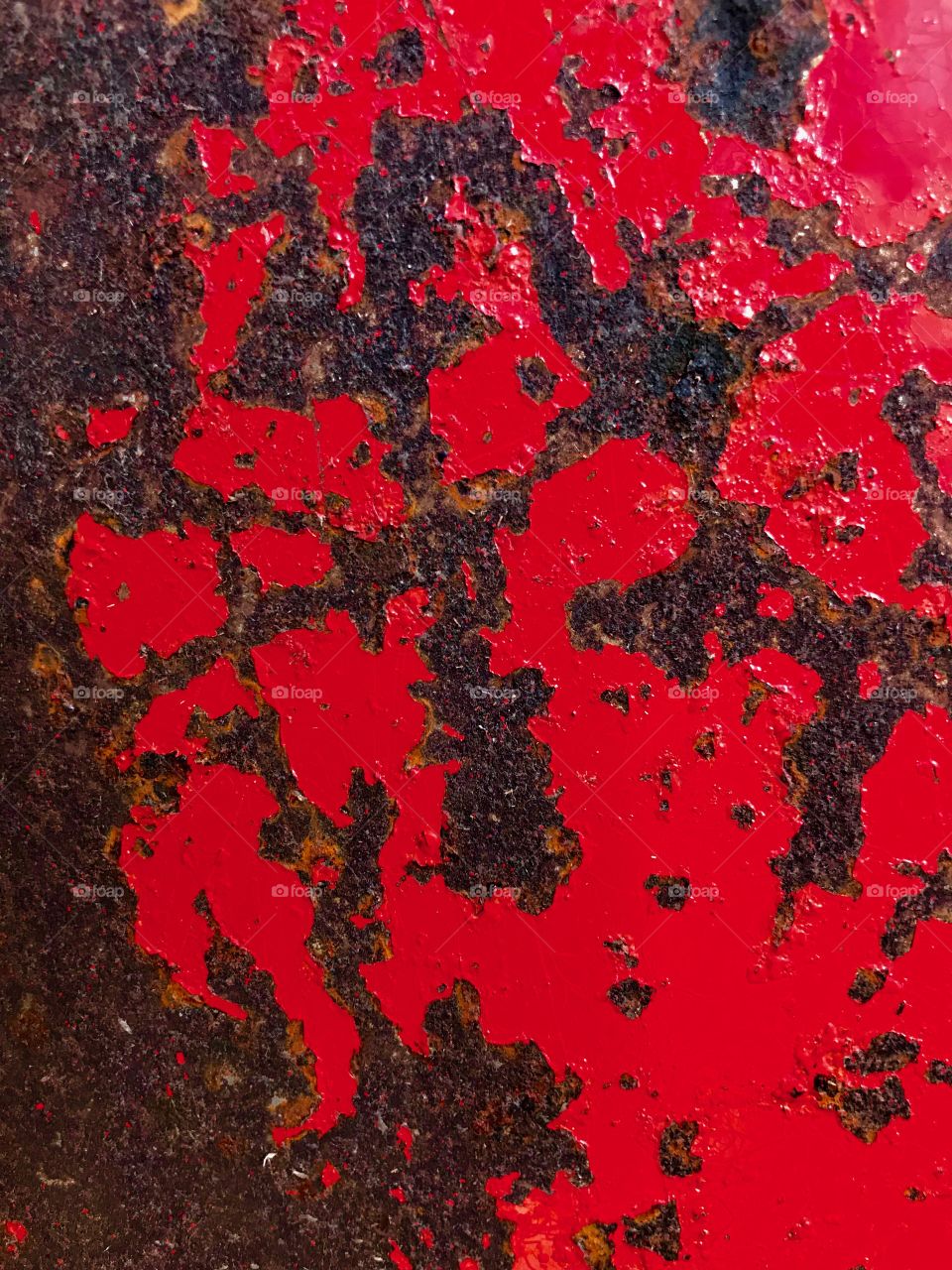 Vibrant Red Paint and Rust