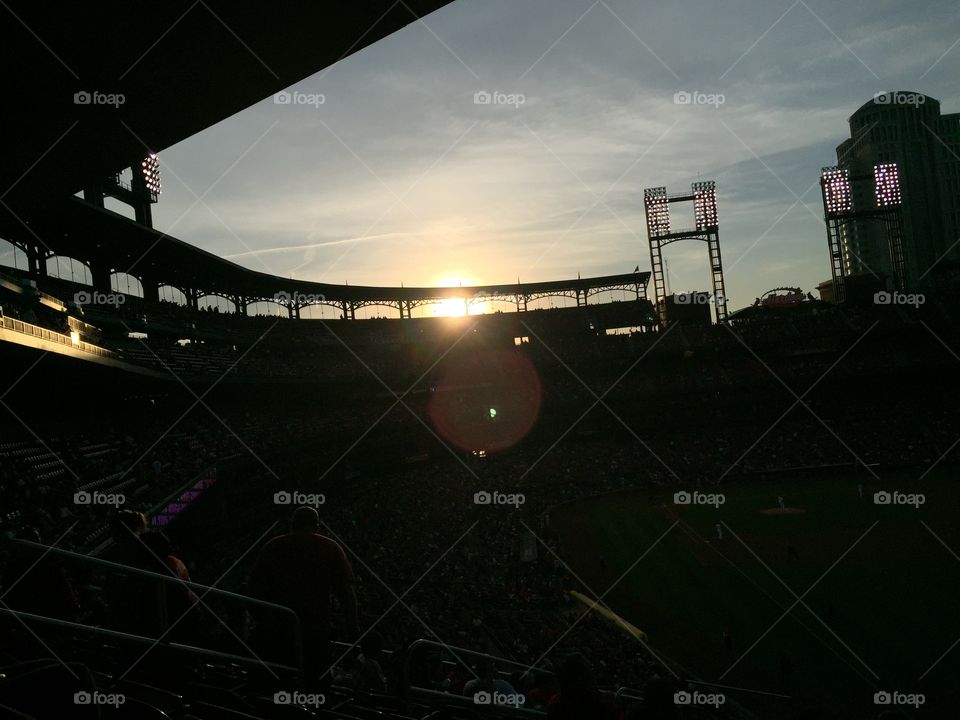 Sun going down over Busch. World greatest baseball team! 