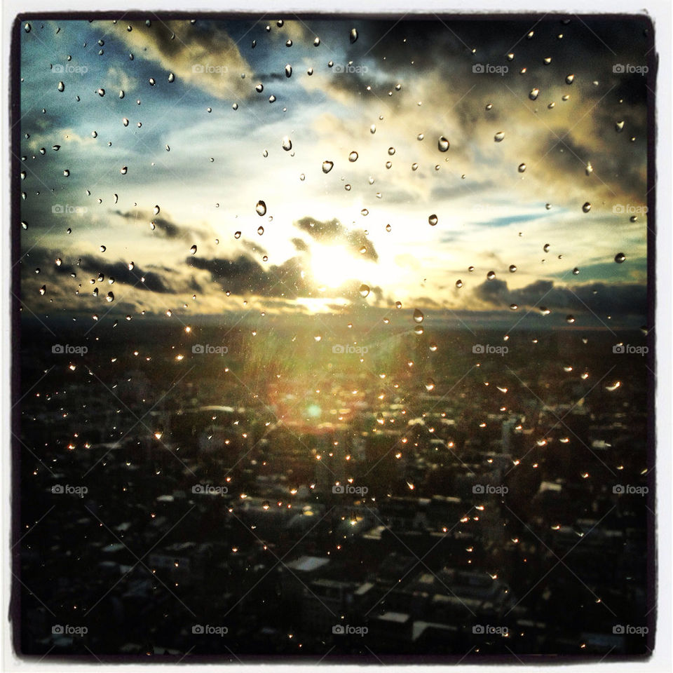 At the top of centrepoint London. The sun appears after a storm but
