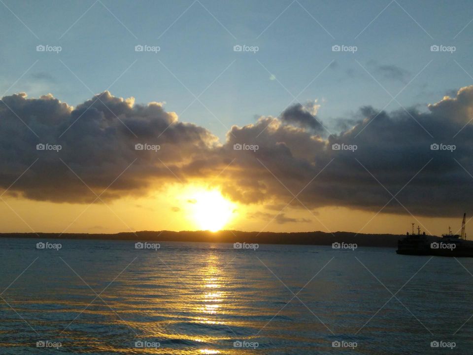 A lovely couple of clouds beyond the sunset. The majestic wings of clouds beyond light and imagination.