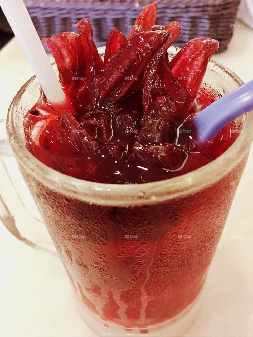 Summer treats: iced cold tangy infusion of delicious roselle (Hibiscus sabdariffa) flower calyxes