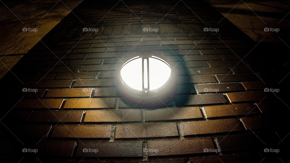 Light shining out the brick.