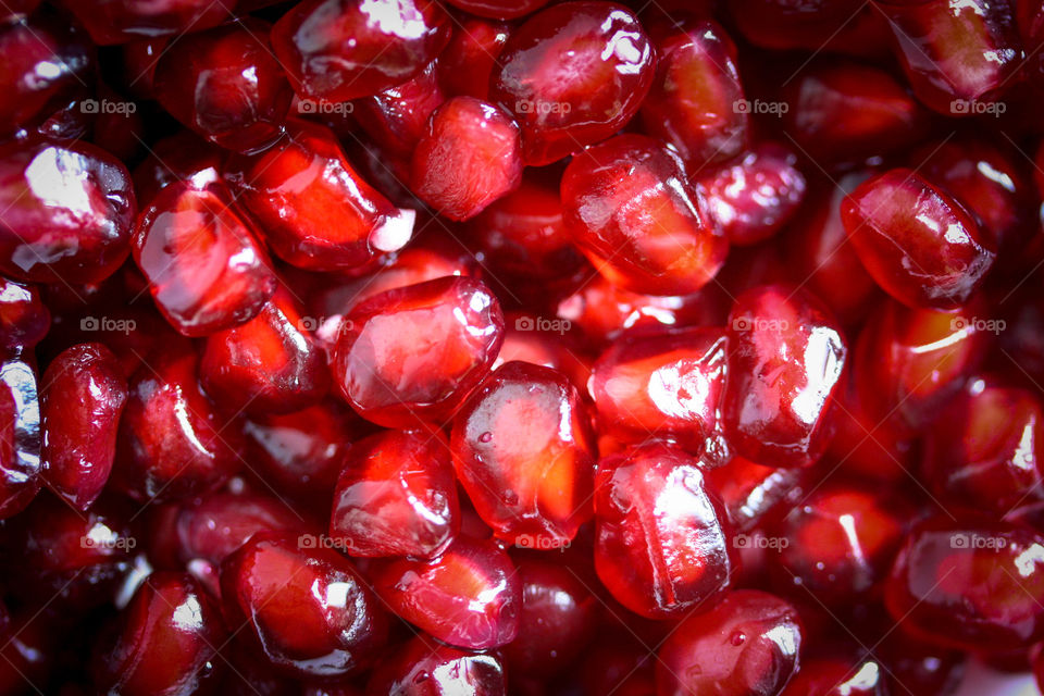 Pomegranate seeds as a snack to a road trip