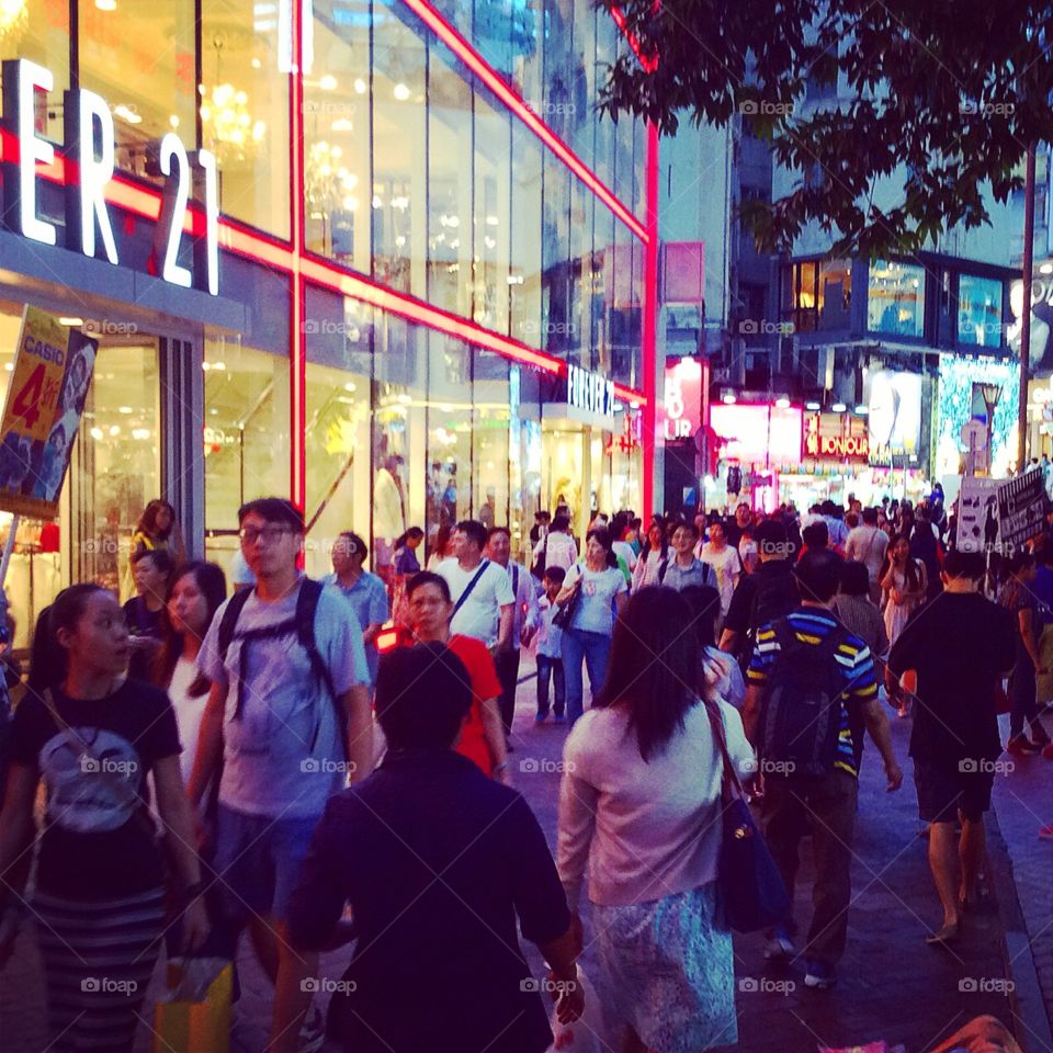 Big city street. Hong Kong street with a crowd of people at night