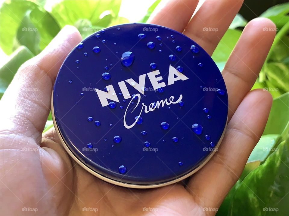 Nivea cream on hand 