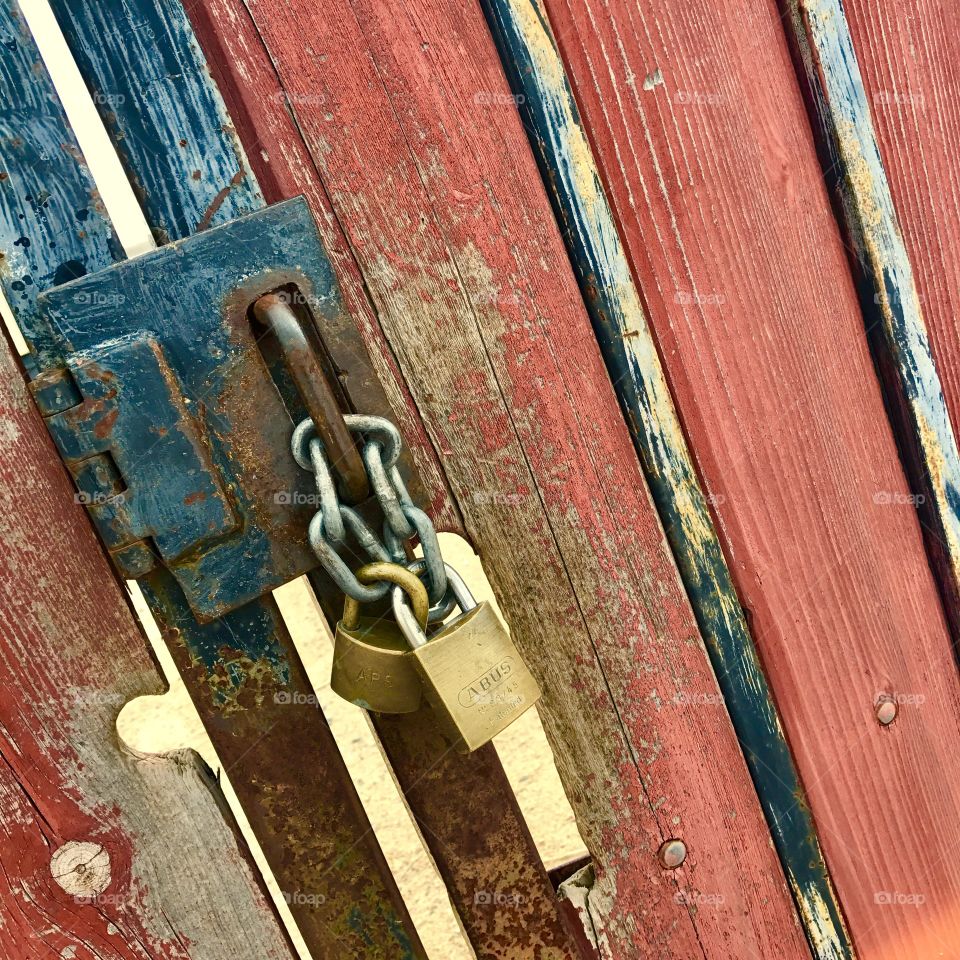 Close-Up Red Locked Gate