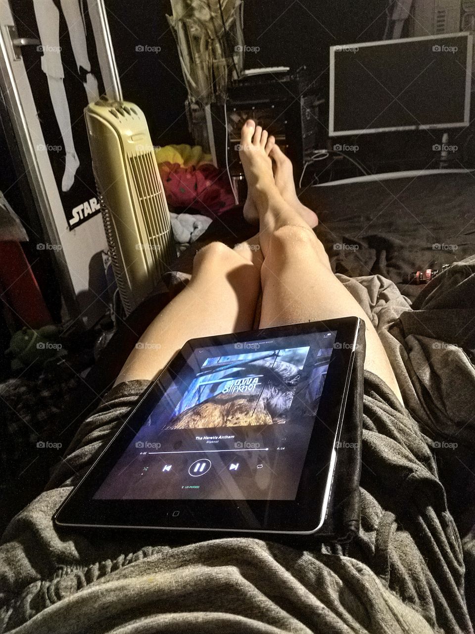 my freshly shaven sexy legs 😝 with my iPad on them while I'm listening to Slipknot