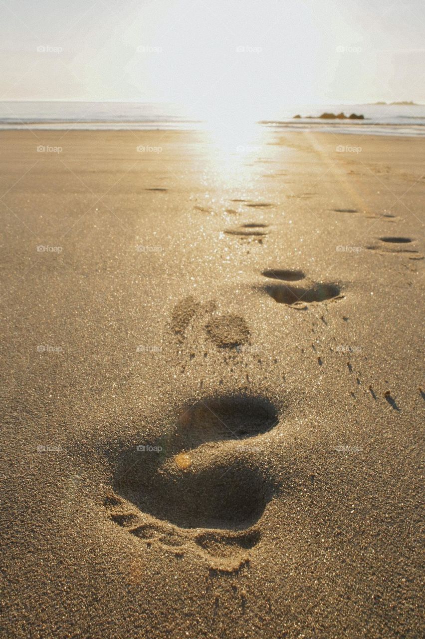 footprints on the sand