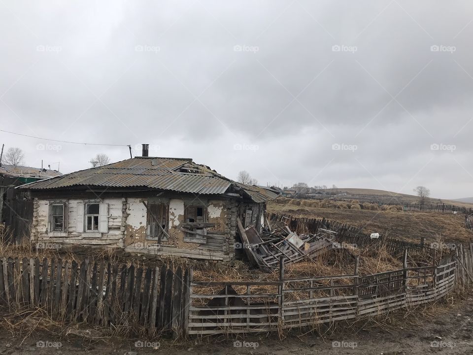 An old house on the edge of the road
