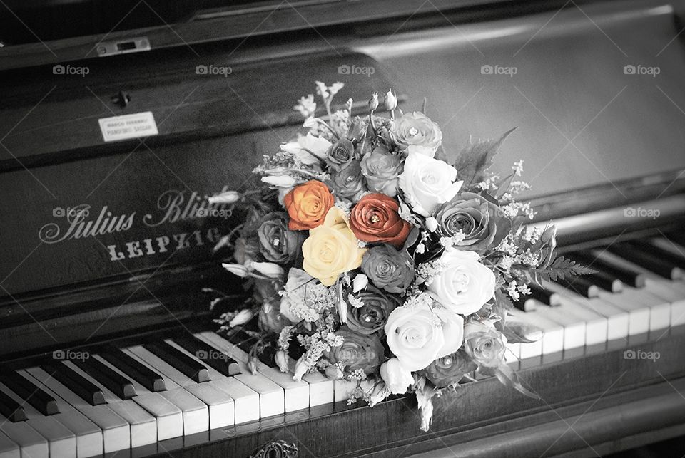 bouquet in a grey piano