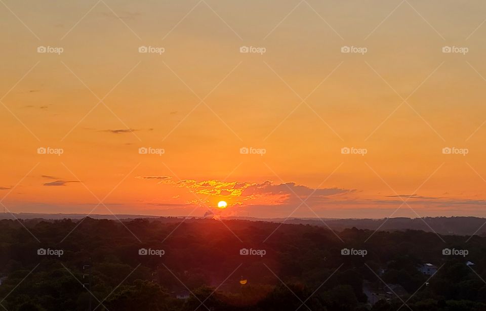 watching the sun rise from the 7th floor