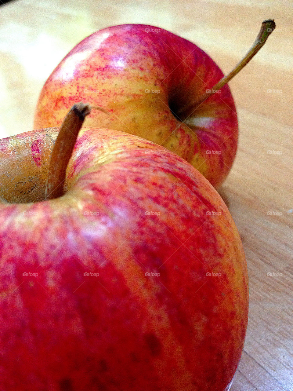 red fresh apple fruit by rgomezphoto