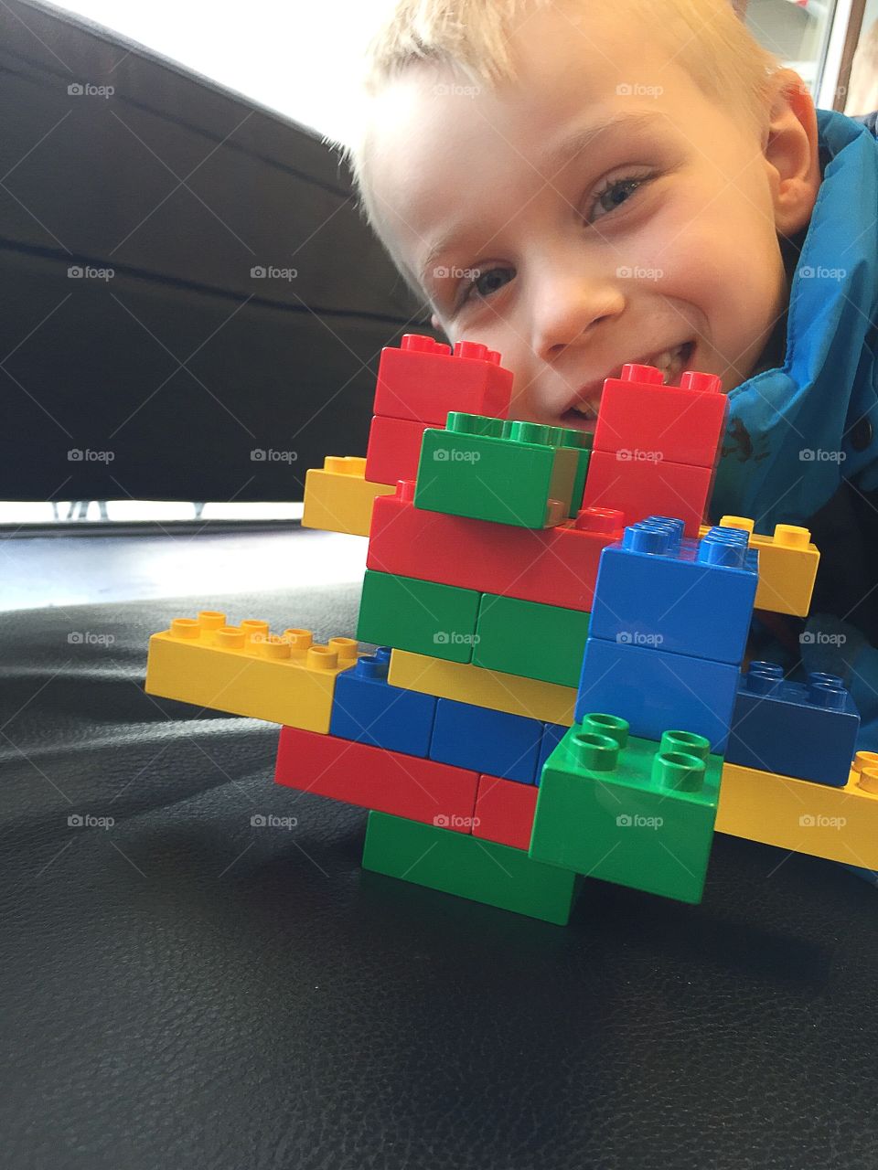 Boy playing with lego