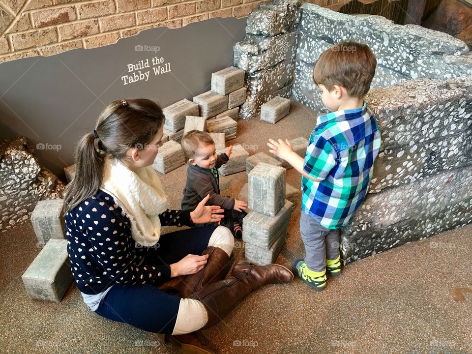 Family playing at the museum.