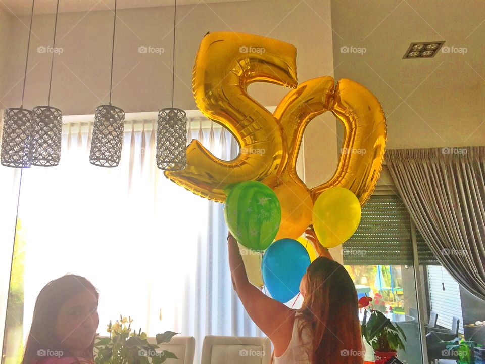 Two girls decorating house