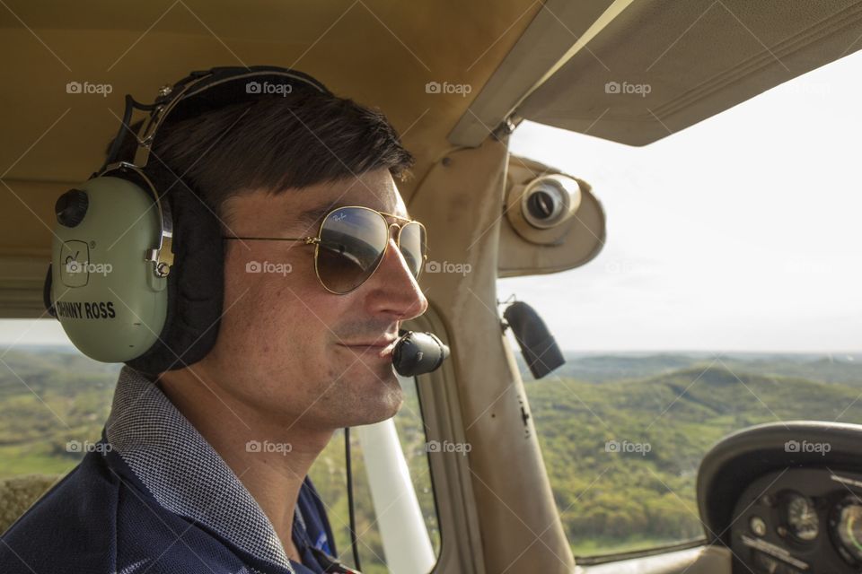 Pilot flying aviator glasses