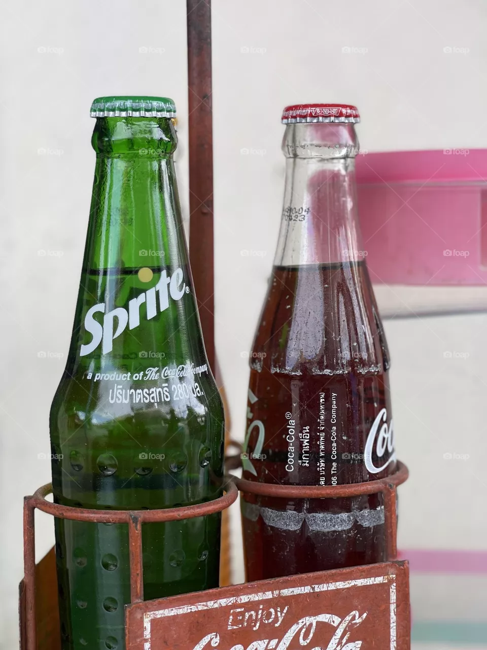 Vintage sprite and coke bottle in Thailand local food stall