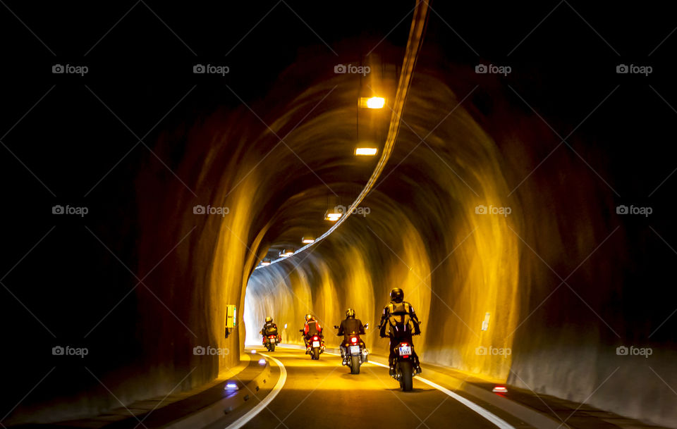 Motorcycles get through tunnel