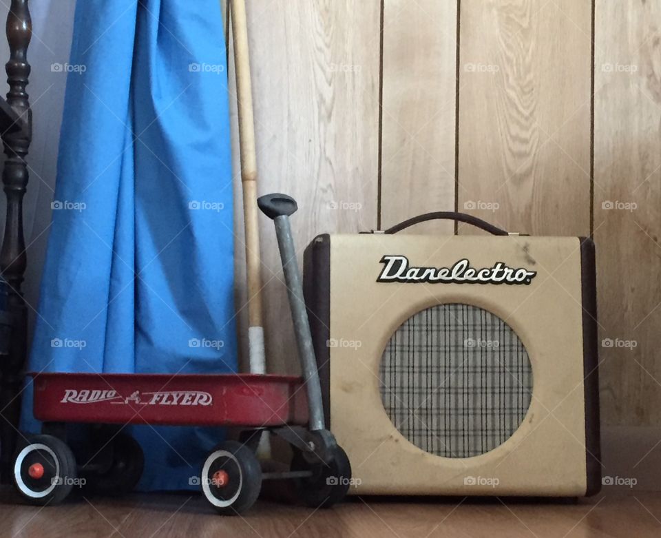 Vintage Danelectric guitar amp and a radio Flyer red wagon