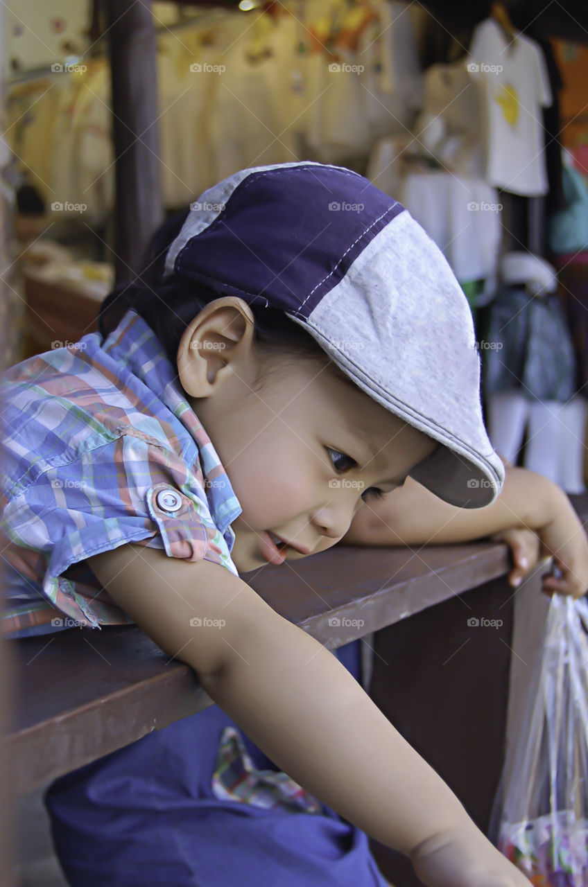 Portrait of a boy, Asian Age 2 years at the floating market.