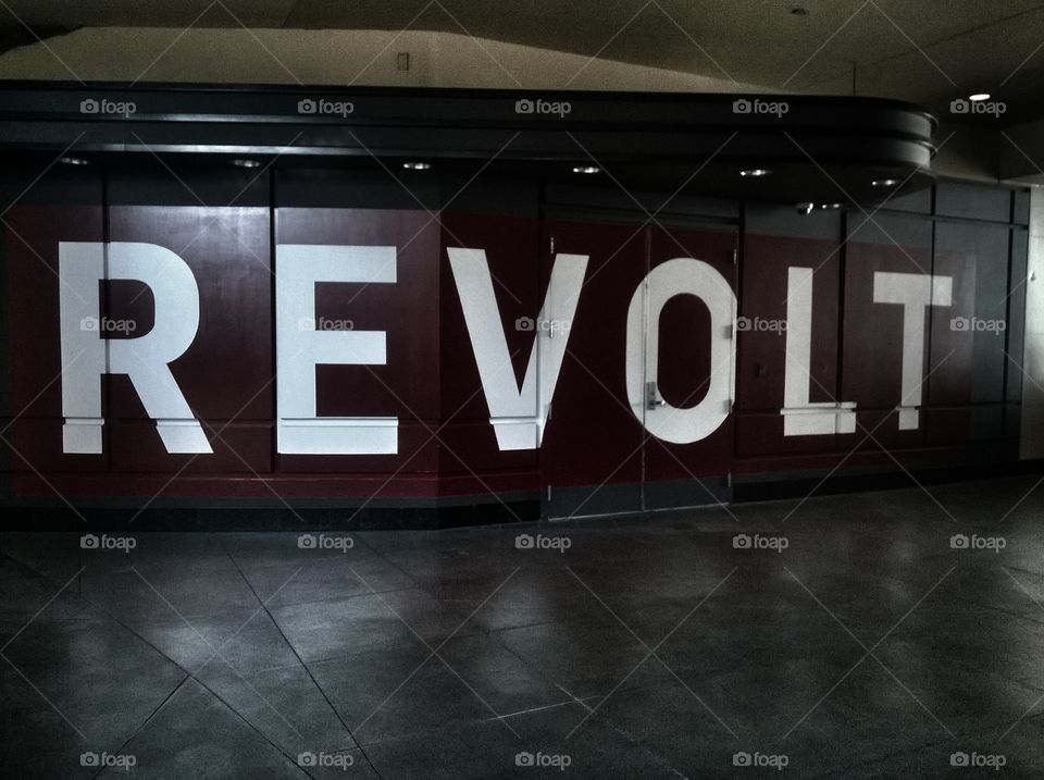 The word "Revolt" painted on the wall, darken version.