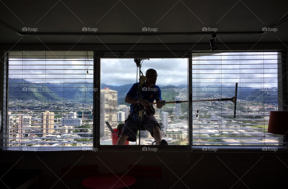 Window washer on a high-rise building 