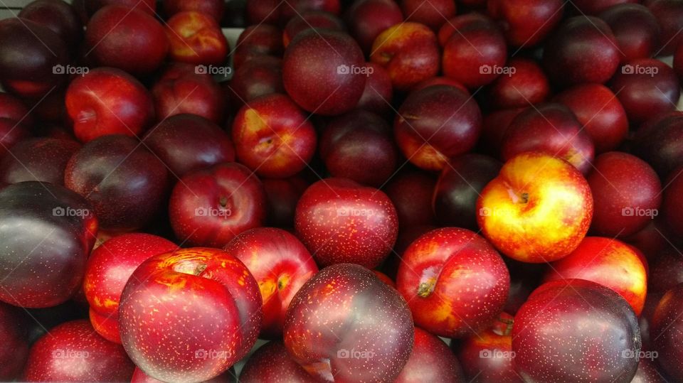 Full frame shot of nectarines in market