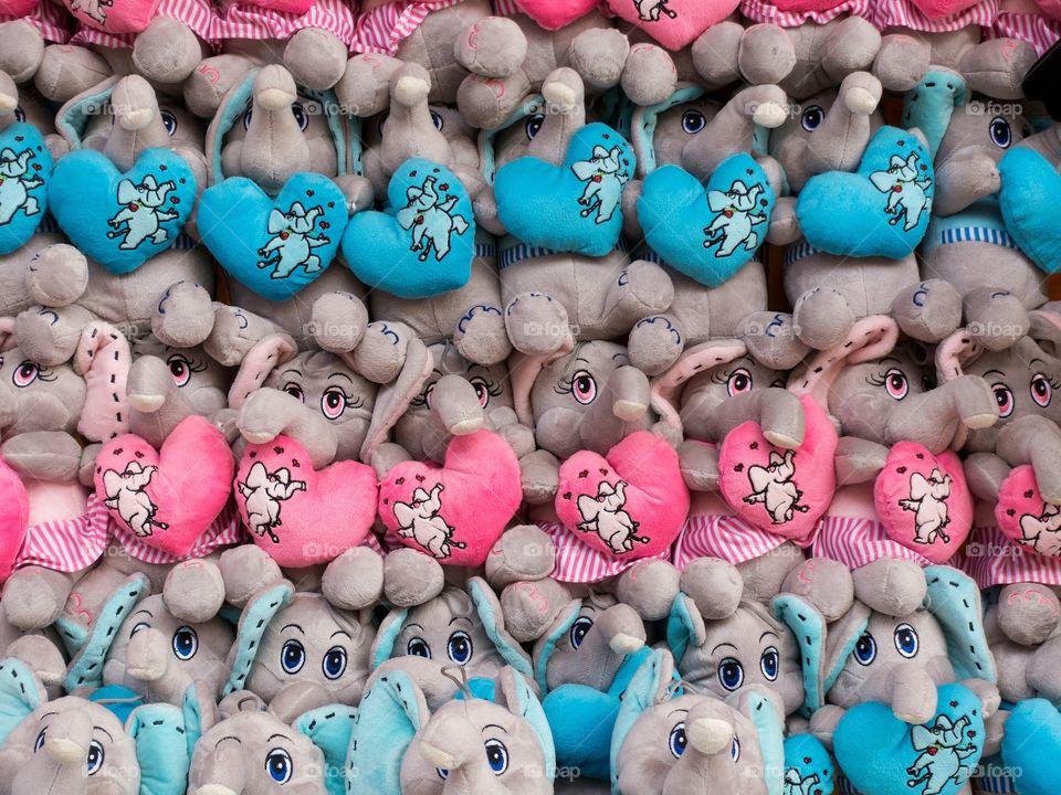 Pink and blue soft cuddly toys