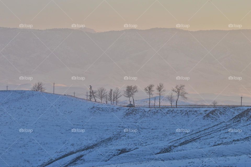road leading to snowy mountains