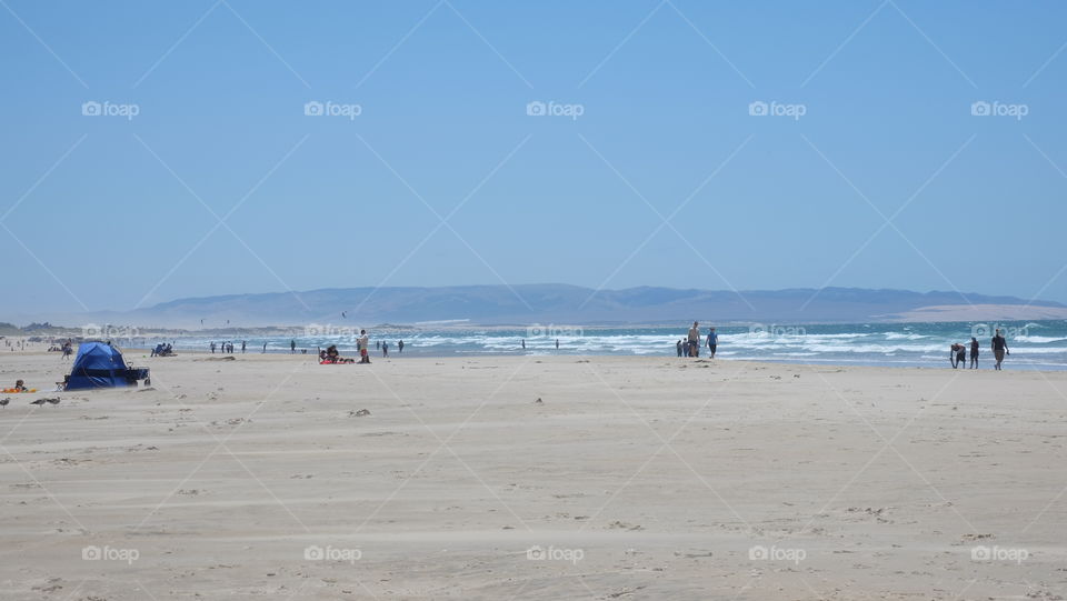 People hanging out on the beach